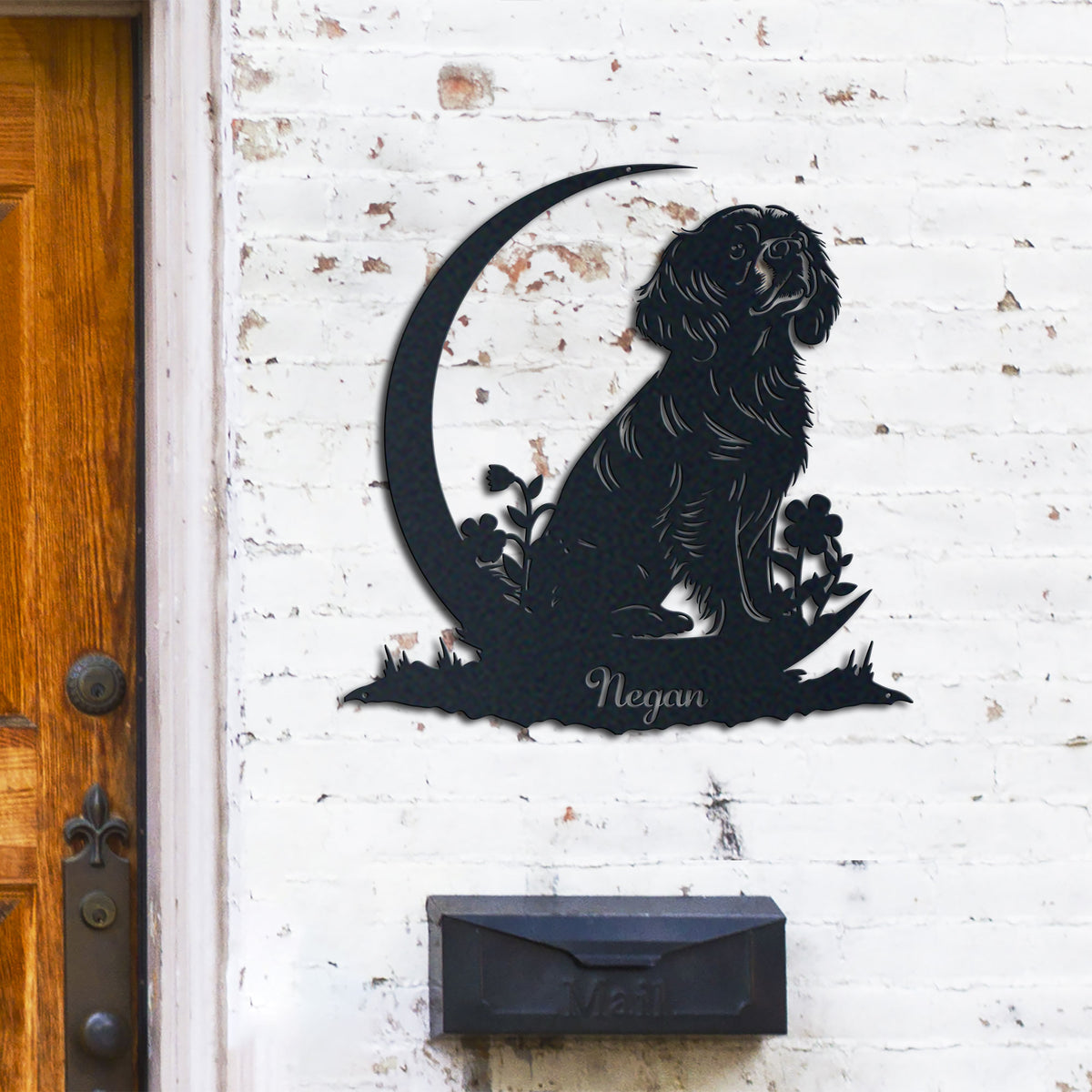 Cavalier King Charles metal wall art displayed on a home wall