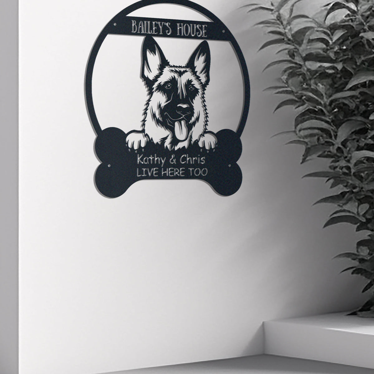 Dog Lovers metal wall art displayed on a home wall