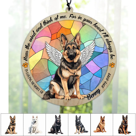 Personalized German Shepherd memorial suncatcher with pet name displayed in a window.