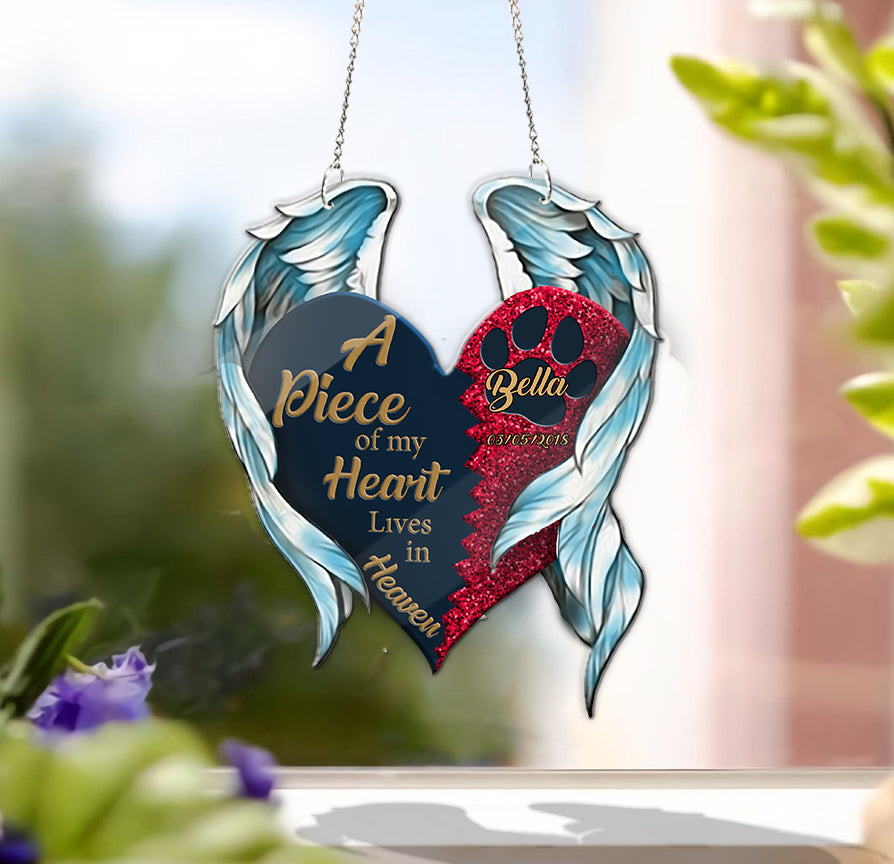 Personalized in loving memory suncatcher hanging in a sunlit window